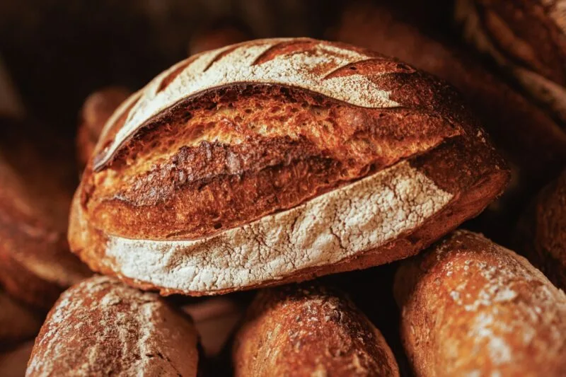 Closeup of crusty freshly baked bread loaves 03 18 06 56 09 utc