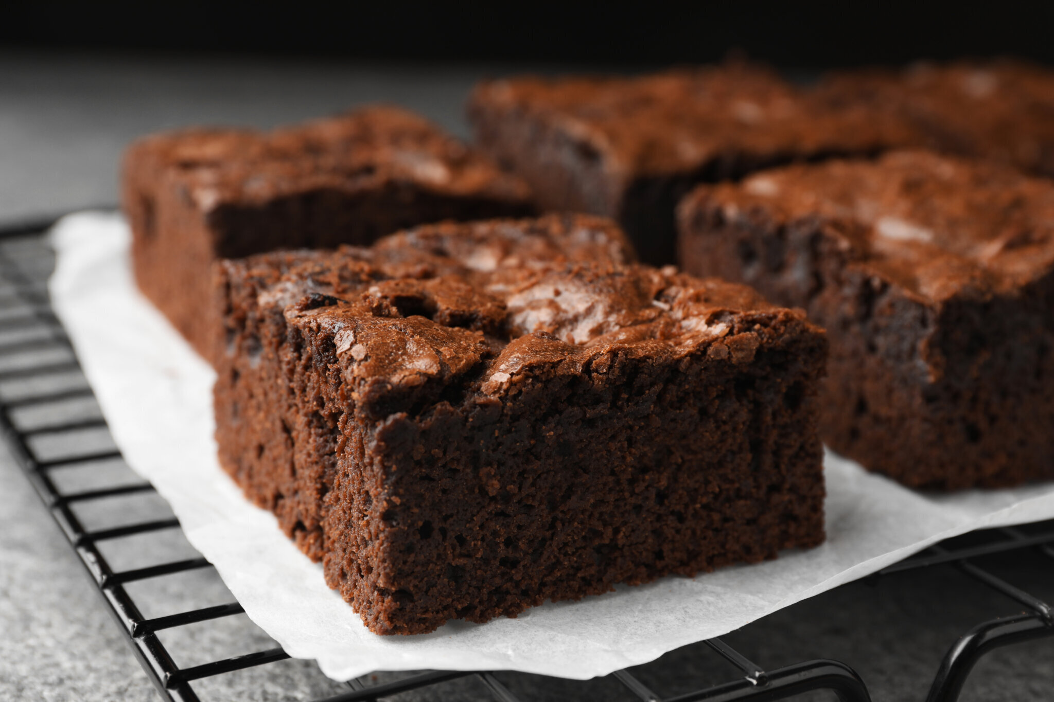 Cooling rack with fresh brownies on grey table cl 03 12 02 41 47 utc