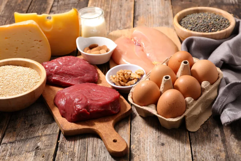 Assortment of protein rich foods on wooden backgro 01 11 08 21 45 utc