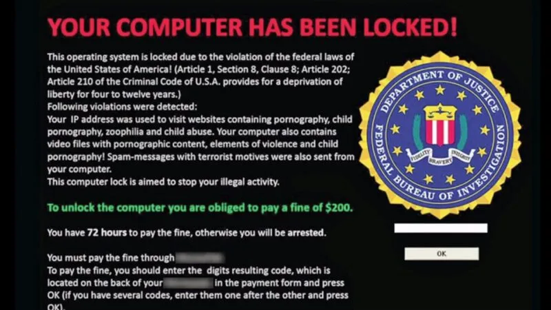 Ecran de calculator care afișează mesajul de răscumpărare al unui atac ransomware