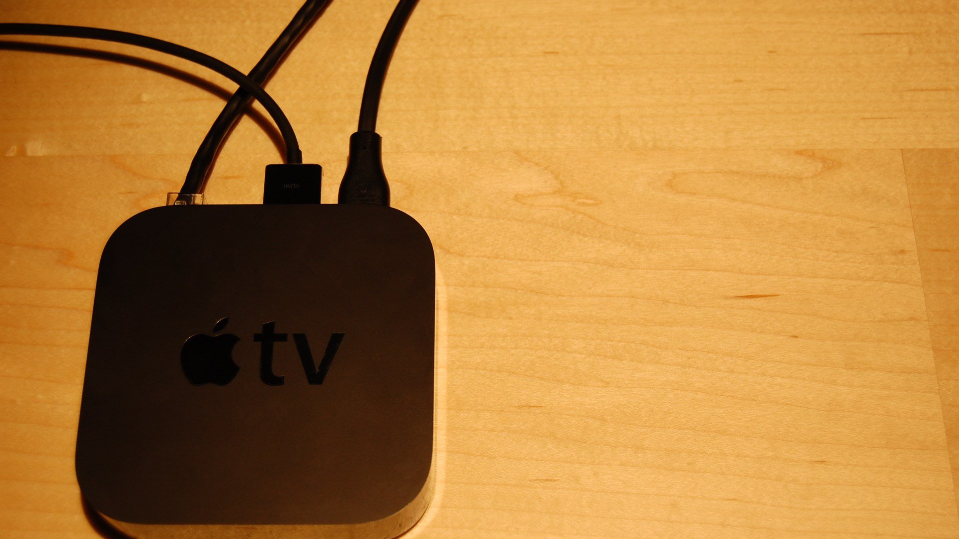 Dispozitiv de streaming Apple TV negru, parte din ecosistemul pe care l-ar completa HomeView