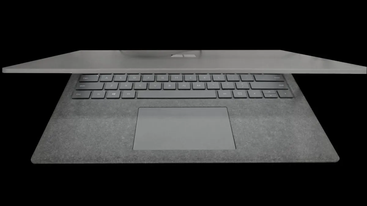 Surface Laptop Ultra Laptop Microsoft Surface argintiu deschis, cu tastatura și touchpadul mare vizibile